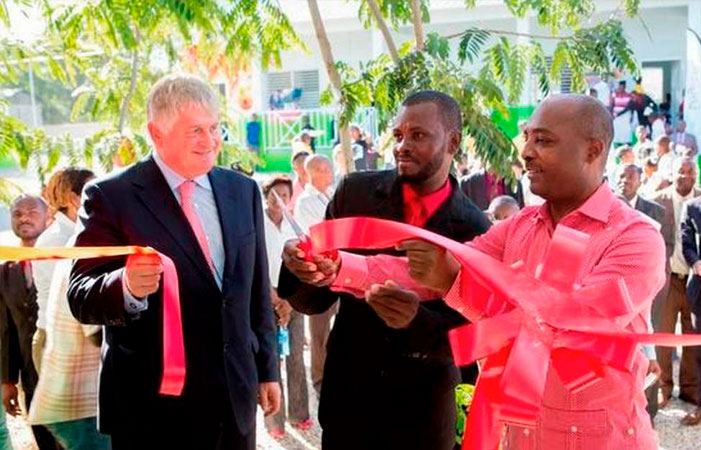 Denis O'Brien, founder and chairman of Digicel, attends ribbon cutting in Haiti