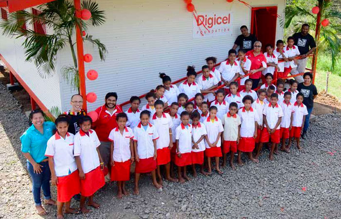 A group of students in Papua New Guinea, where the Digicel Foundation has built more than 500 classrooms in rural communities