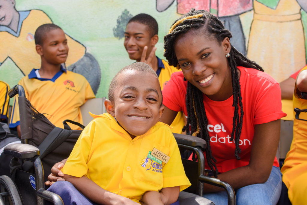 Digicel Jamaica Foundation volunteer and child