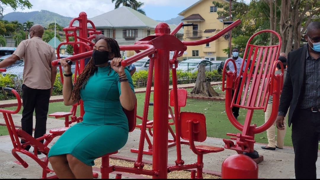 Digicel Trinidad and Tobago Foundation CEO Penny Gomez tries out the Nelson Mandela Park’s new exercise equipment